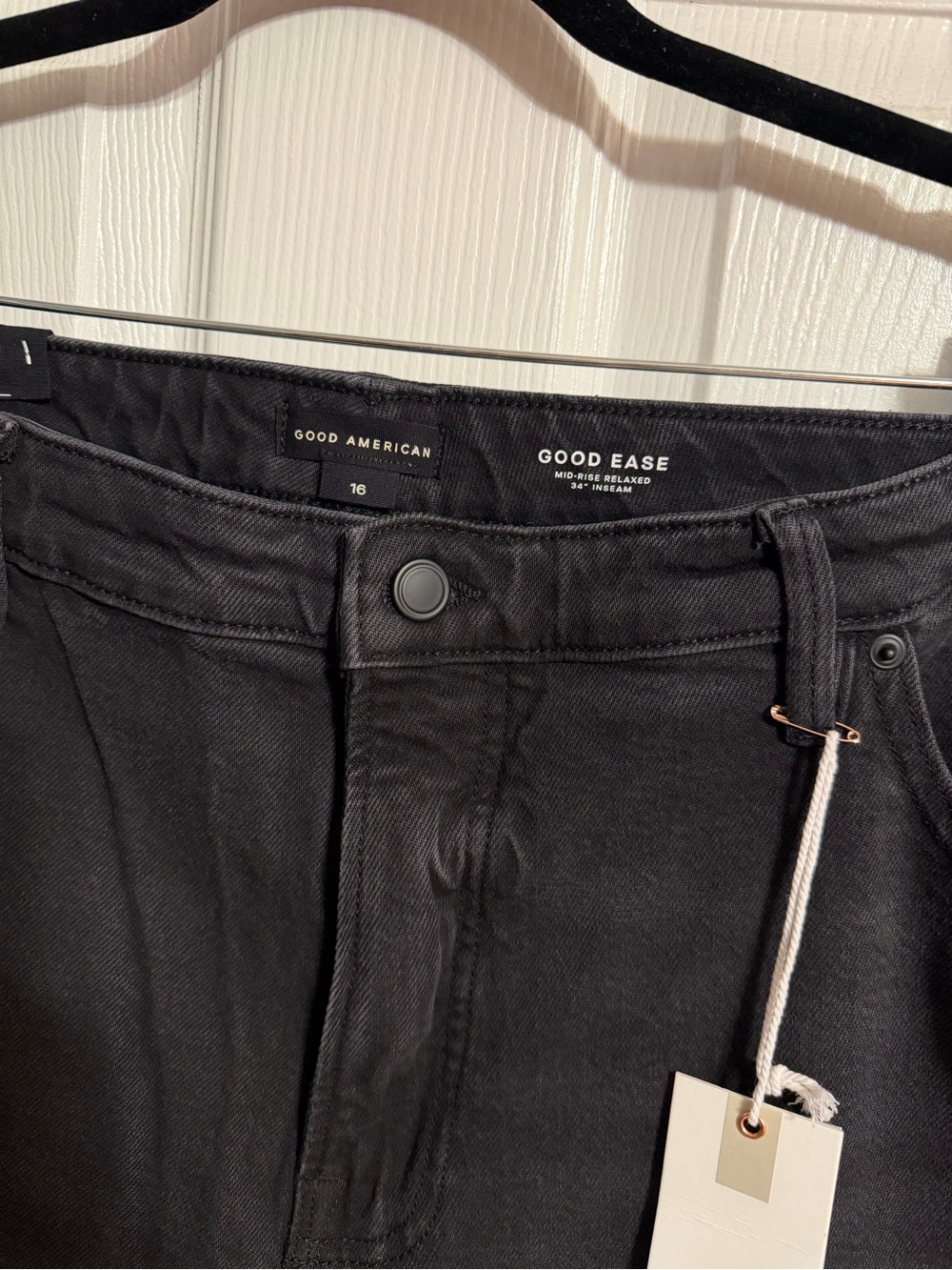 Black stretch mid rise relaxed wide leg 34” inseam tall black jeans raw hem